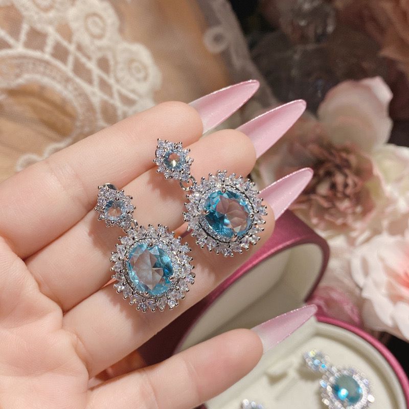 Luxury daughter wind bright luminous sea blue rhinestone earrings anti-allergic full diamond flower Japanese and Korean anti-allergic earrings