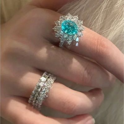 Rich daughter gold wind light luxury egg surface rhinestone ring full of diamonds sunflower shape Japan and South Korea cold malachite green advanced ring