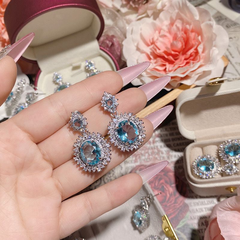 Luxury daughter wind bright luminous sea blue rhinestone earrings anti-allergic full diamond flower Japanese and Korean anti-allergic earrings