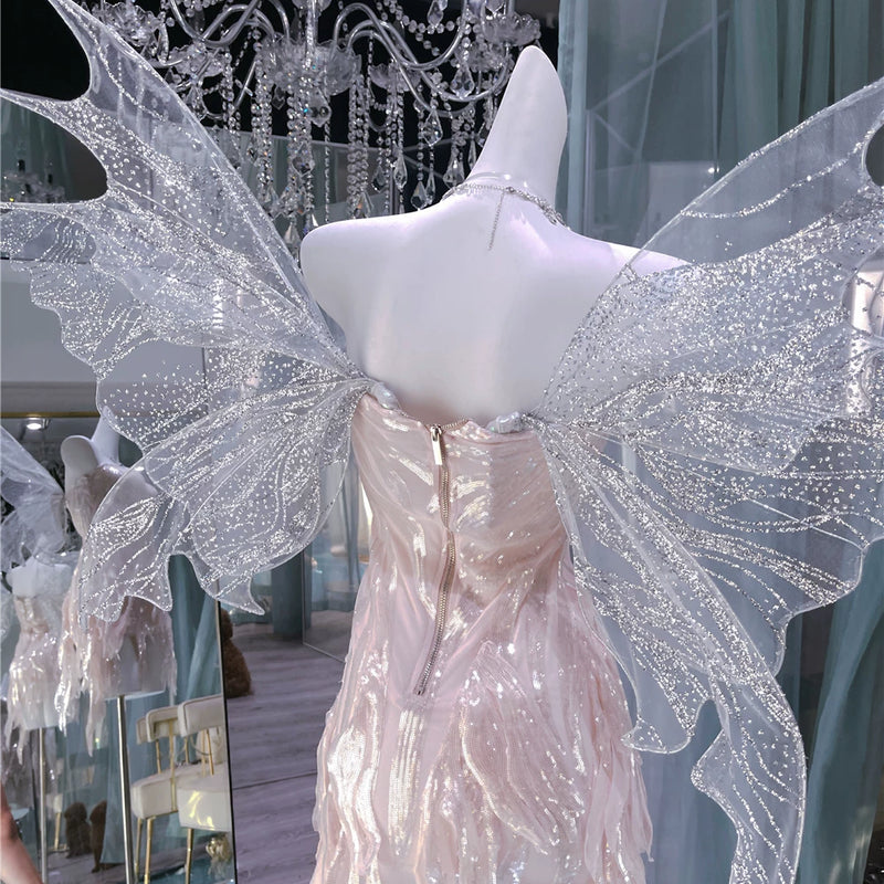 The skin is as cold as ice and the bones are as clear as a river |   Handmade custom sparkling irregular strapless gown with fairy wings