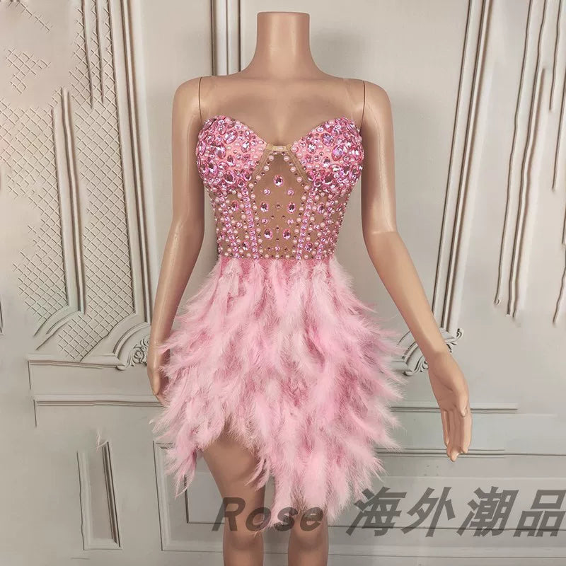 Elegant white swan-inspired feather skirt dress - slimming, rhinestone embellished mini dress for vacation, runway, party, and evening events