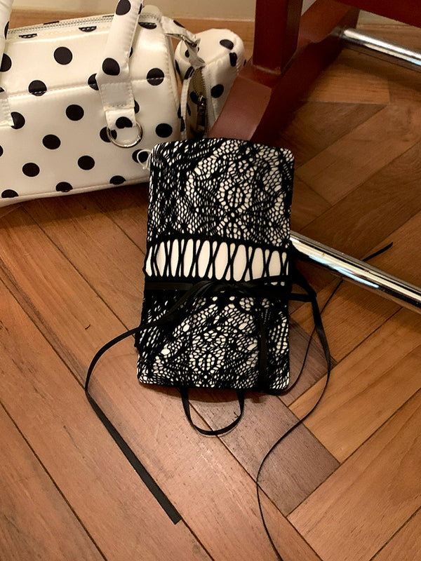 Niche design brand hollow white drawstring pantyhose women's autumn new light and mature fashion wear