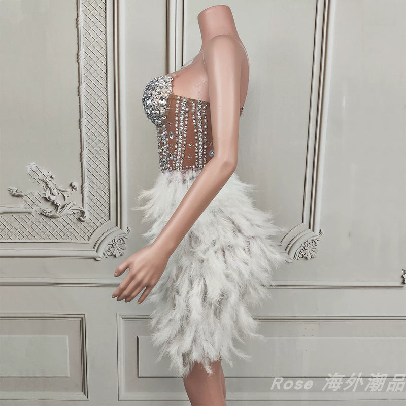 Elegant white swan-inspired feather skirt dress - slimming, rhinestone embellished mini dress for vacation, runway, party, and evening events