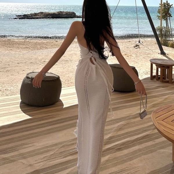 European and American sexy low cut knitted dress with women's backless cross strap design, niche slim fit and slimming, hip hugging long skirt