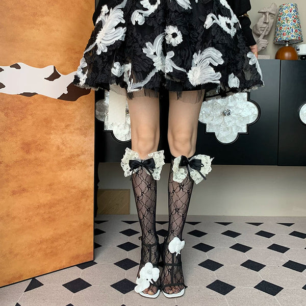 2025 autumn new French light luxury sweet romantic elegant niche black bow hollow calf socks women DF