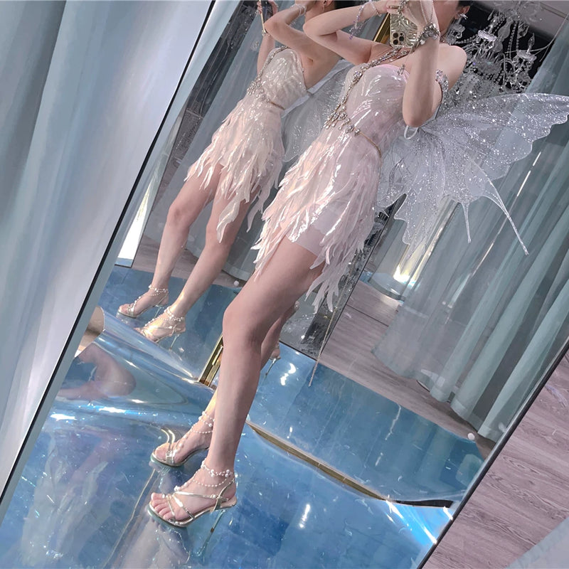 The skin is as cold as ice and the bones are as clear as a river |   Handmade custom sparkling irregular strapless gown with fairy wings