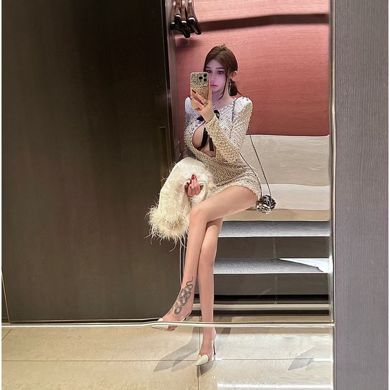 French light luxury celebrity daughter gold bow heavy industry pearl hip wrap long-sleeved dress pure desire hollow temperament short skirt