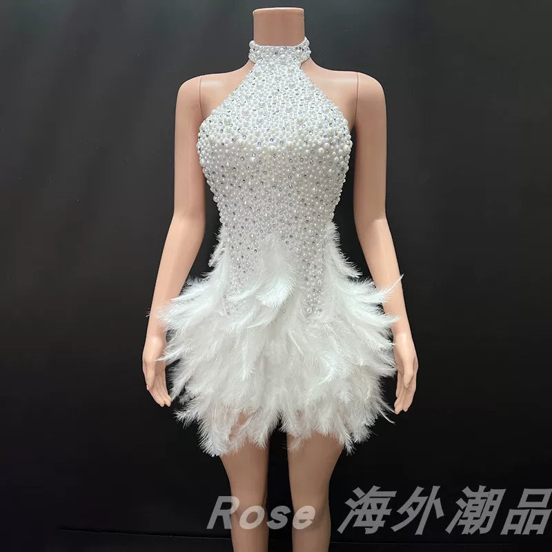 Elegant white swan-inspired feather skirt dress - slimming, rhinestone embellished mini dress for vacation, runway, party, and evening events