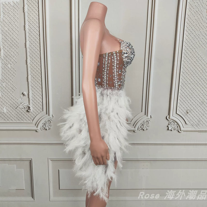 Elegant white swan-inspired feather skirt dress - slimming, rhinestone embellished mini dress for vacation, runway, party, and evening events