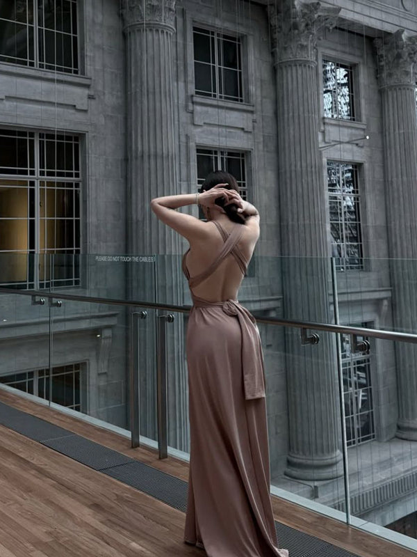 Sexy and spicy girl with low cut, backless, hanging neck dress, women's slim fit, beach vacation, slimming, hip hugging long dress