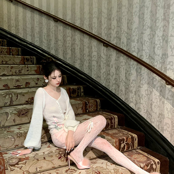 Niche design brand hollow white drawstring pantyhose women's autumn new light and mature fashion wear