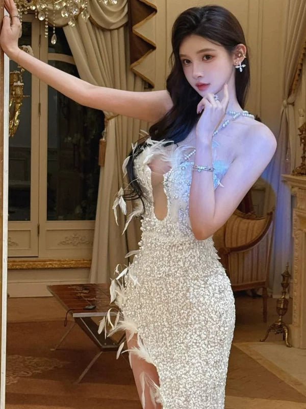 Elegant birthday party gown: strapless, heavy beaded & pearl embellished, high-slit feather evening dress