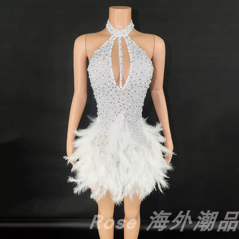 Elegant white swan-inspired feather skirt dress - slimming, rhinestone embellished mini dress for vacation, runway, party, and evening events