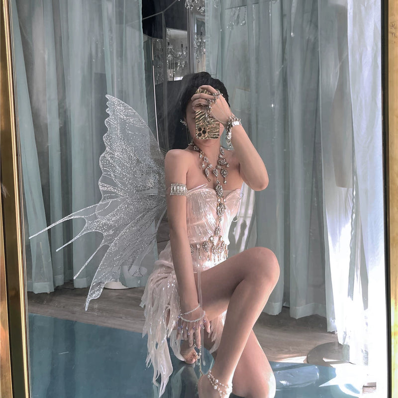 The skin is as cold as ice and the bones are as clear as a river |   Handmade custom sparkling irregular strapless gown with fairy wings