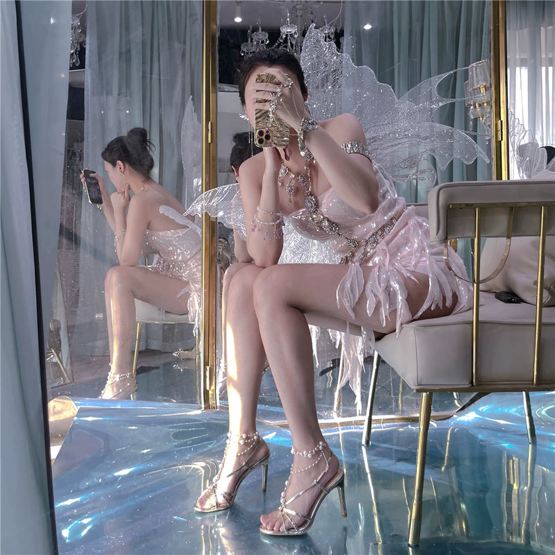 The skin is as cold as ice and the bones are as clear as a river |   Handmade custom sparkling irregular strapless gown with fairy wings