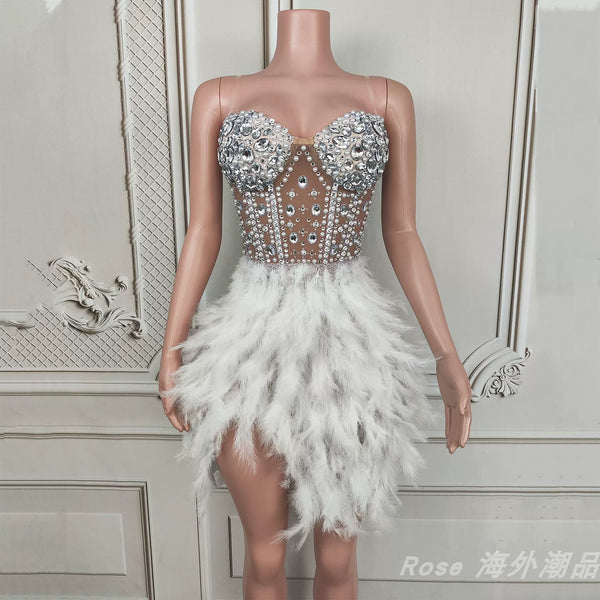 Elegant white swan-inspired feather skirt dress - slimming, rhinestone embellished mini dress for vacation, runway, party, and evening events