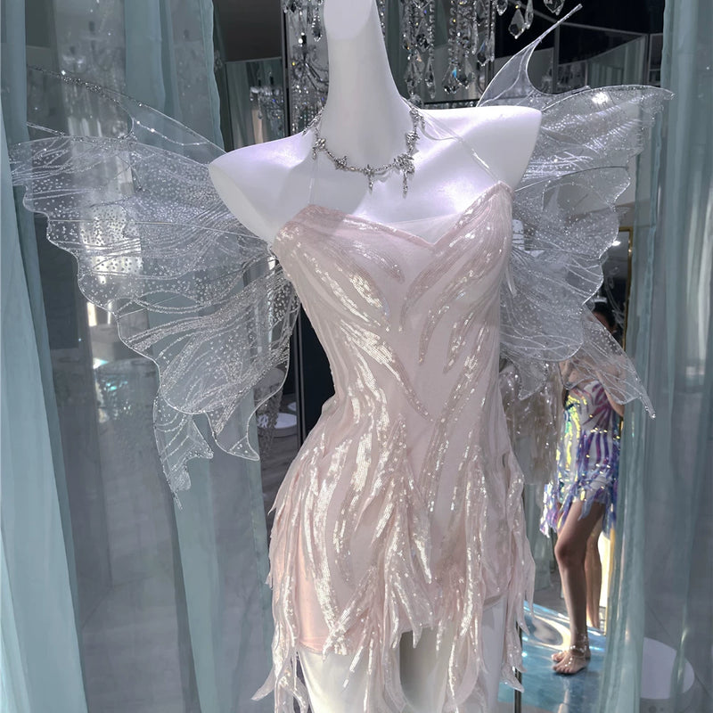 The skin is as cold as ice and the bones are as clear as a river |   Handmade custom sparkling irregular strapless gown with fairy wings