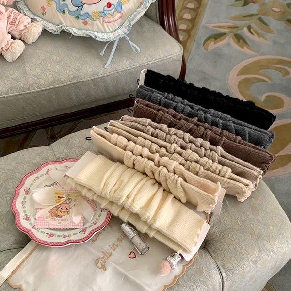 Fashion niche autumn and winter oat-colored calf socks women's thickened warm wool knee socks white stockings