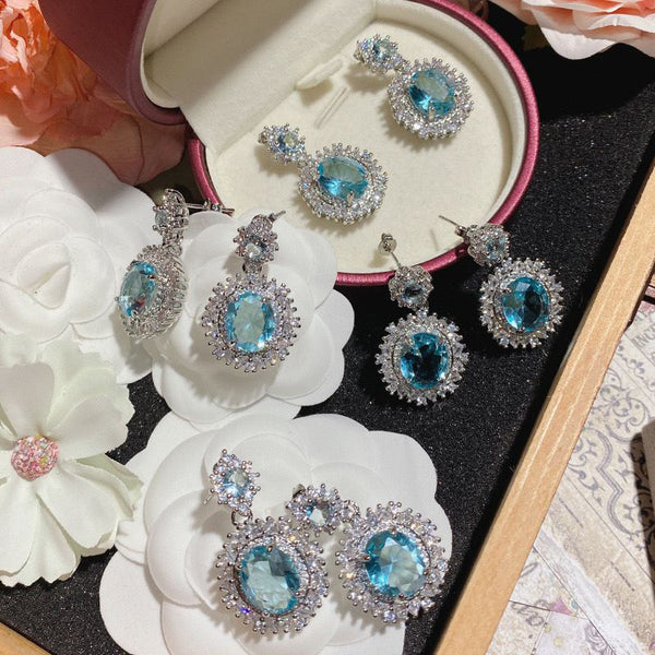 Luxury daughter wind bright luminous sea blue rhinestone earrings anti-allergic full diamond flower Japanese and Korean anti-allergic earrings